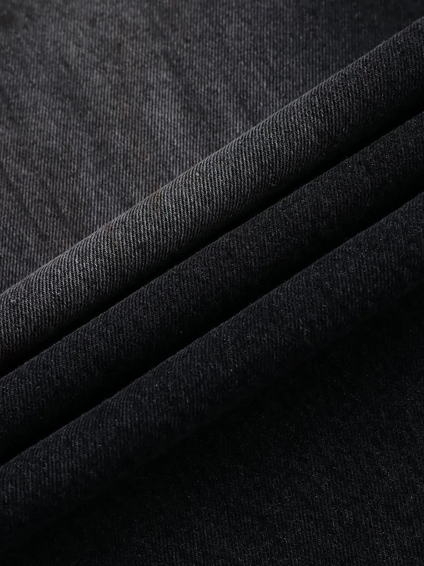 Black Luxenk Vintage Wide Leg Jeans by Trendsi, featuring a relaxed fit and classic denim style.