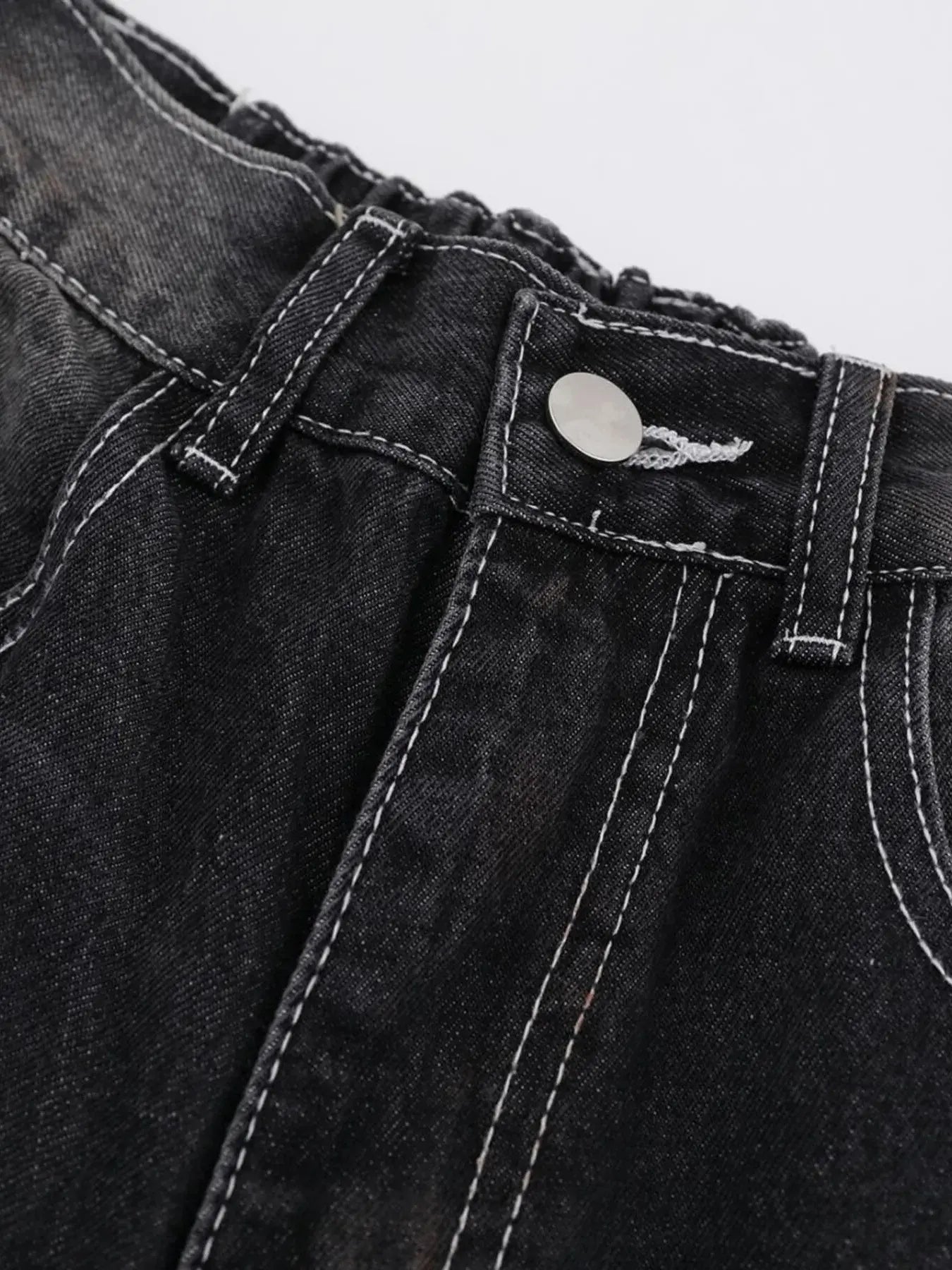 Black Luxenk Vintage Wide Leg Jeans by Trendsi, showing high-waisted fit and relaxed wide-leg silhouette on a model.