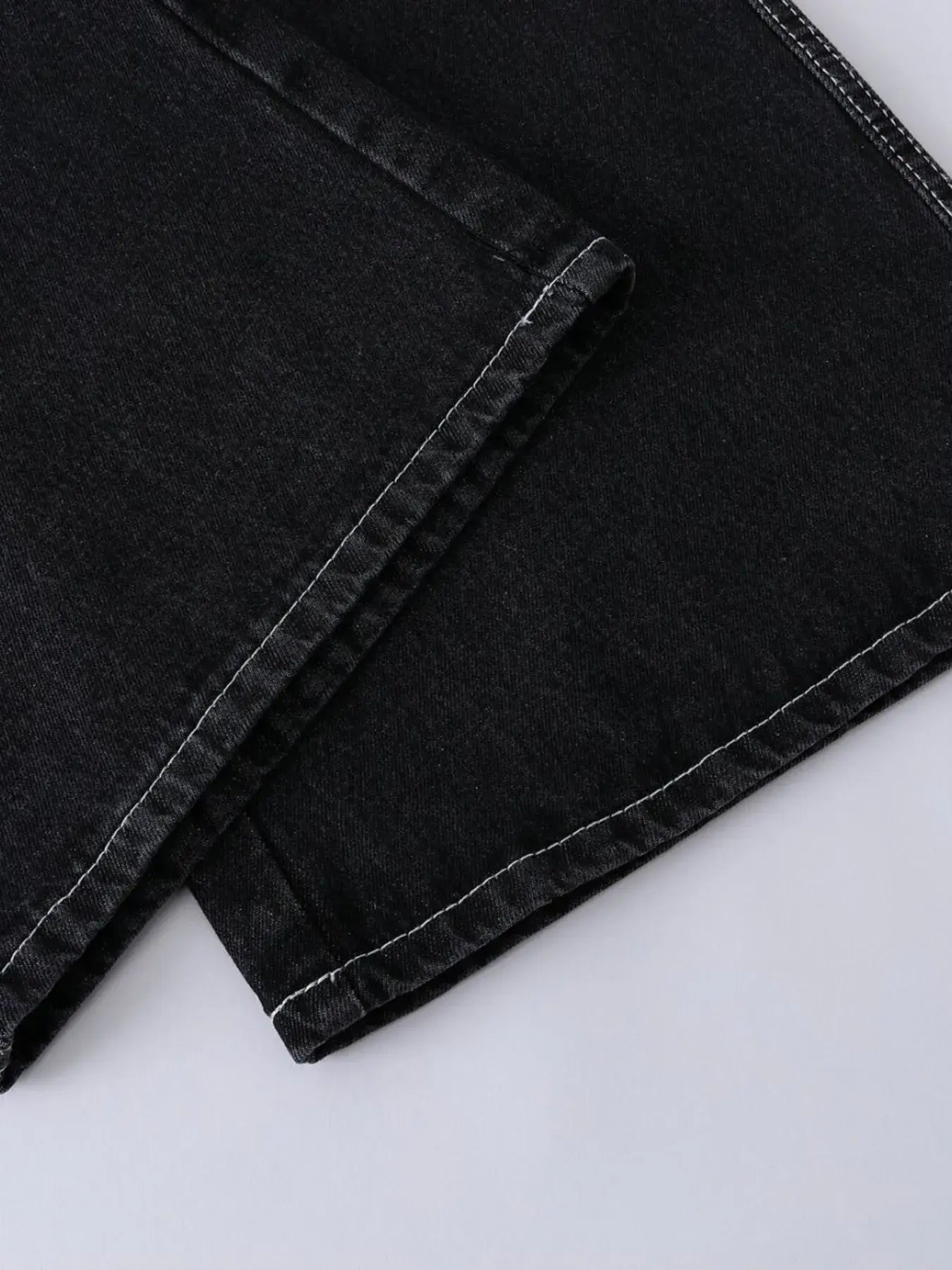 Black Luxenk Vintage Wide Leg Jeans by Trendsi, showing a relaxed fit with a high-rise waist and classic denim texture.