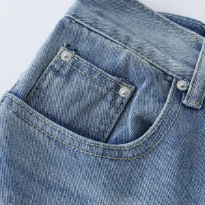 Blue Luxenk High Waist Wide Leg Jeans by Trendsi, featuring a flattering high-rise fit and relaxed wide leg style.