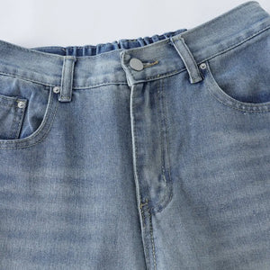 Blue Luxenk High Waist Wide Leg Jeans by Trendsi, showcasing a relaxed fit and stylish wide-leg design on a model.