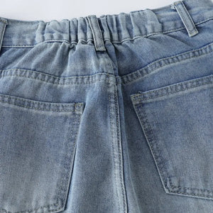 Blue Luxenk High Waist Wide Leg Jeans by Trendsi, showing the relaxed fit and wide-leg design on a model.