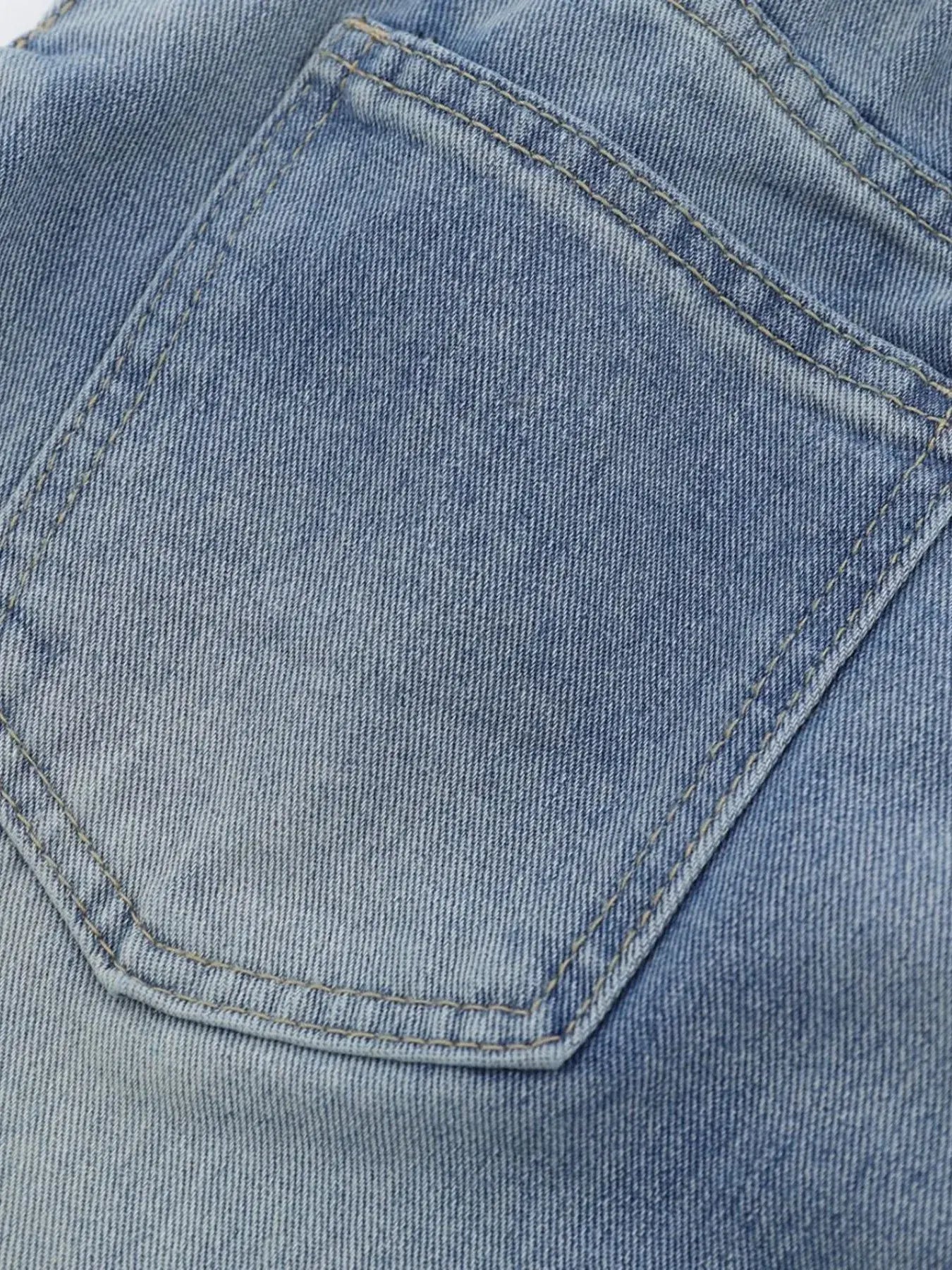 Blue Luxenk high waist wide leg jeans from Trendsi, featuring a relaxed fit and classic denim style.