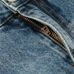 Blue washed denim shorts from Luxenk© by Trendsi, featuring a casual fit and rolled hem, perfect for summer wear.