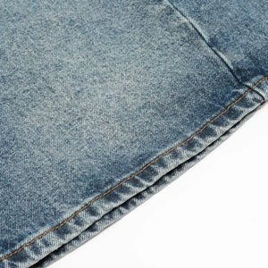 Light blue Luxenk Washed Denim shorts from Trendsi featuring a casual fit and distressed details, shown on a model.