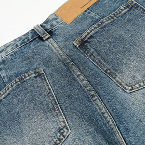 Light blue washed denim shorts from Luxenk©, casual fit with distressed details, styled for everyday summer wear.