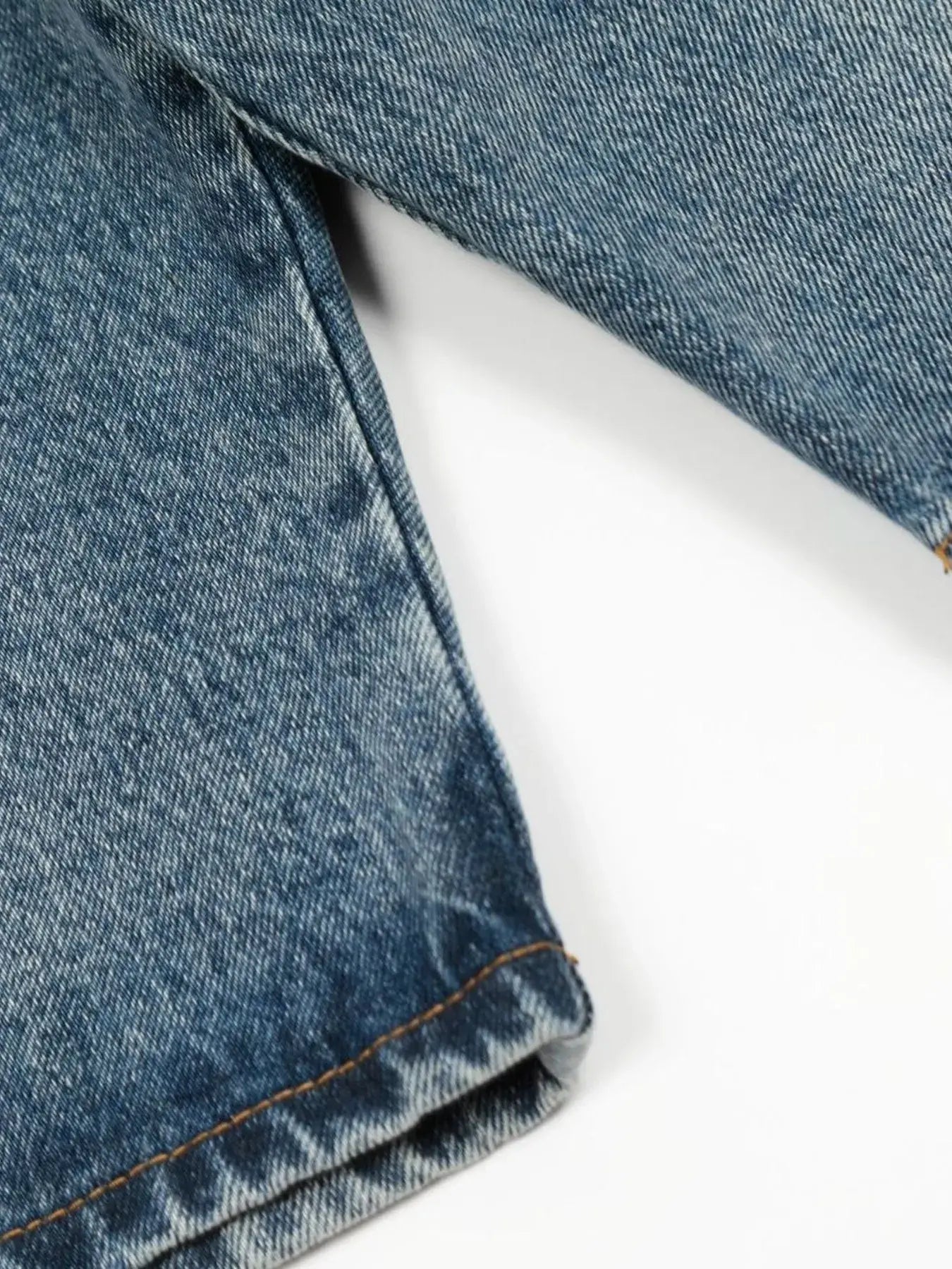 Blue washed denim shorts by LUXENK©, trendy casual shorts with a distressed finish and classic five-pocket design.