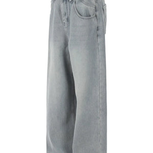 Blue LUXENK© Wide Leg Jeans from Trendsi, featuring a relaxed fit and classic denim style, shown on a model.
