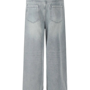 Blue Luxenk Wide Leg Jeans by Trendsi, featuring a relaxed fit and high waist, shown on a model.