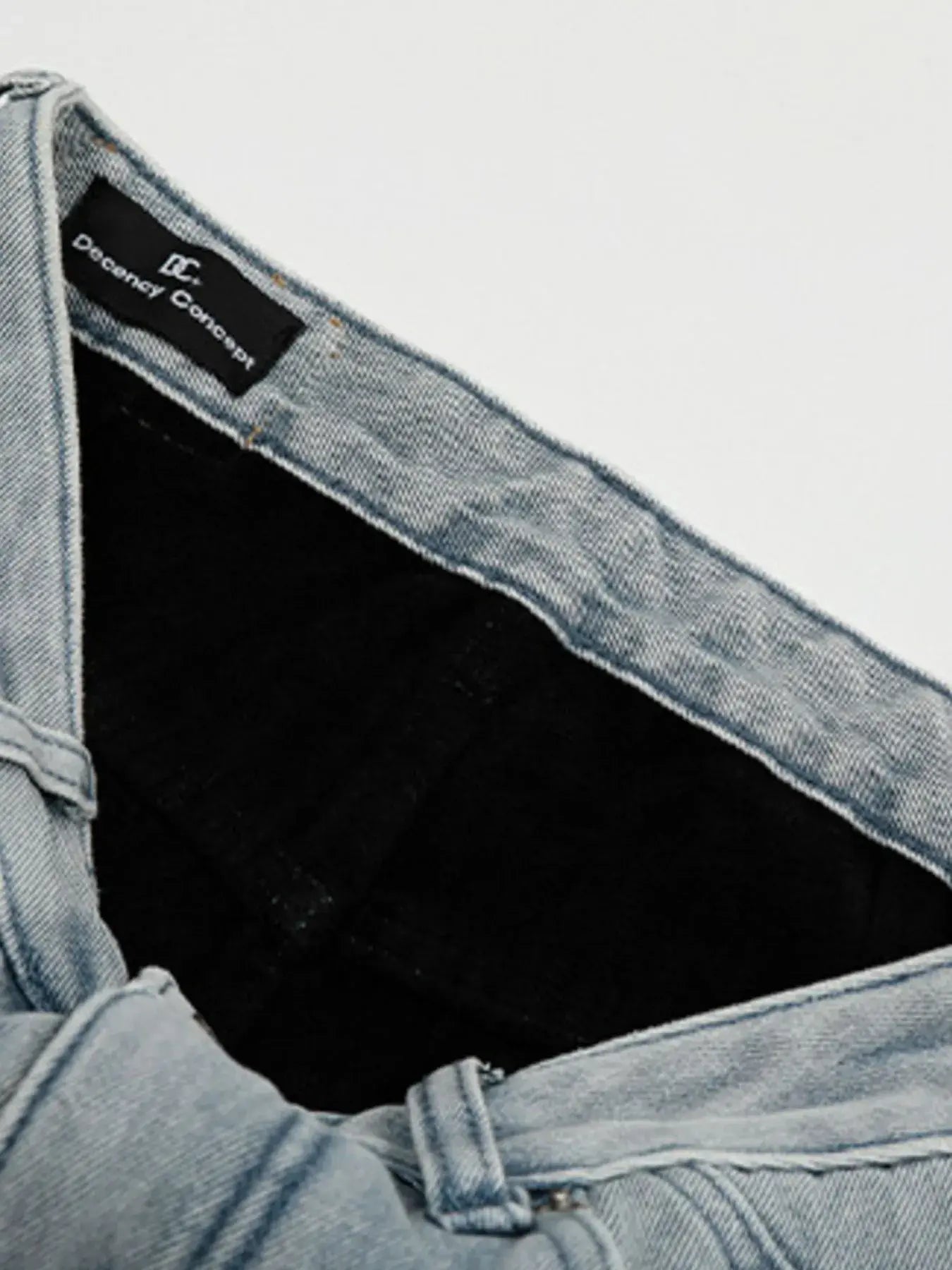 Light blue Luxenk Wide Leg Jeans by Trendsi featuring a relaxed fit and high waist, displayed on a model.