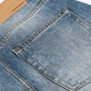 Blue LUXENK© "Wide Leg Vintage" jeans by Trendsi, showing the relaxed fit and classic denim style with wide legs.
