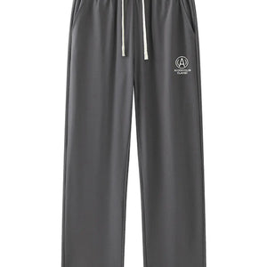 Caramel-colored LUXENK© Drawstring Sweatpants by Trendsi, featuring a relaxed fit and adjustable waistband for comfortable wear.