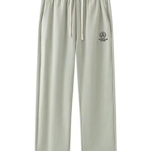 Caramel-colored LUXENK© drawstring sweatpants with relaxed fit, side pockets, and adjustable waistband, casual loungewear for women.