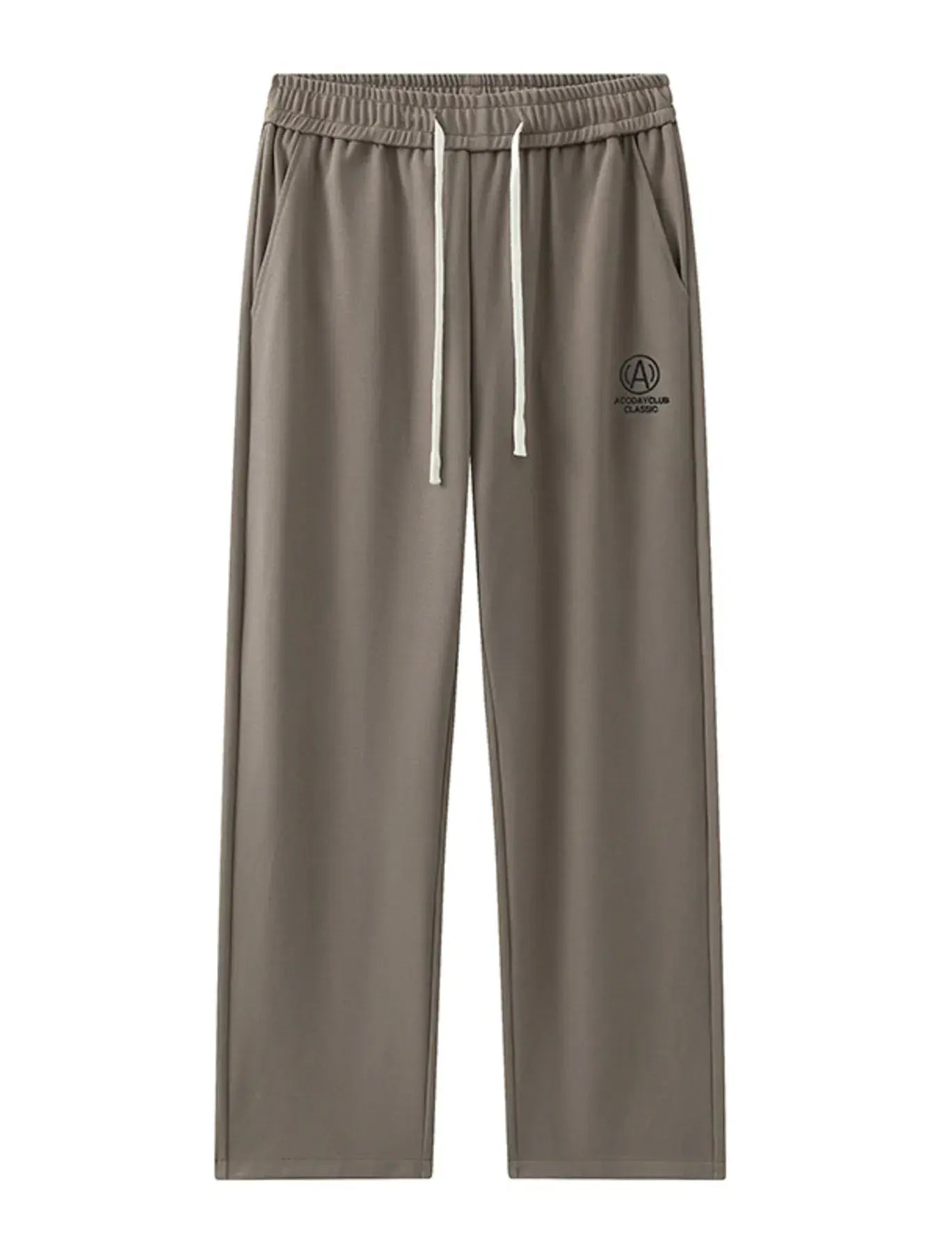 Caramel-colored Luxenk© drawstring sweatpants with elastic waistband and relaxed fit, shown on a model.