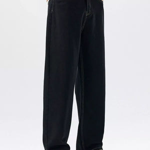 Luxenk Plus Wide Leg Jeans in classic black, stylish high-waisted denim with a relaxed fit, displayed on a model.