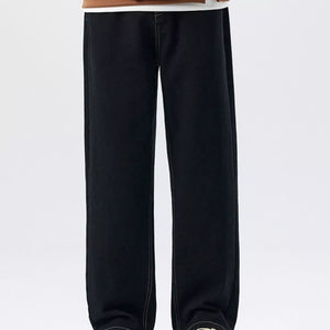 Black Luxenk Plus Wide Leg Jeans by Trendsi, showing the relaxed fit and classic style on a model.