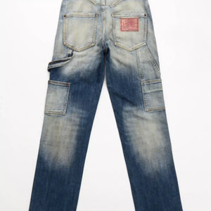 Dark distressed LUXENK© jeans by Trendsi, featuring a slim fit and rugged design, displayed on a neutral background.