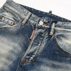 Dark distressed LUXENK© jeans by Trendsi, featuring a relaxed fit and faded detailing, displayed on a model.