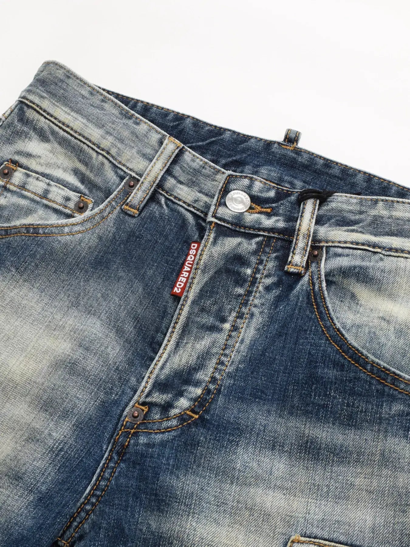 Dark distressed LUXENK© jeans by Trendsi, featuring a relaxed fit and faded detailing, displayed on a model.