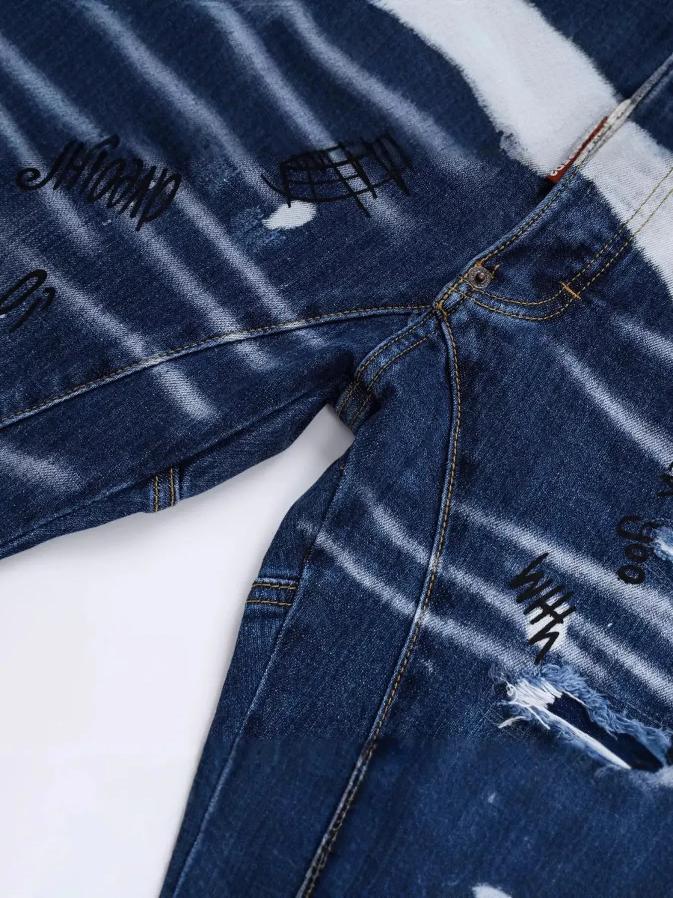 Dark Luxenk "Graffiti" jeans by Trendsi, featuring a stylish urban graffiti print and classic denim fit.