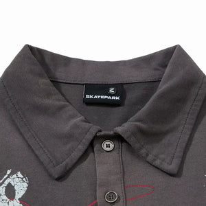 Dark gray Luxenk Classic Polo Shirt by Trendsi, featuring a collared design with short sleeves and a comfortable fit.