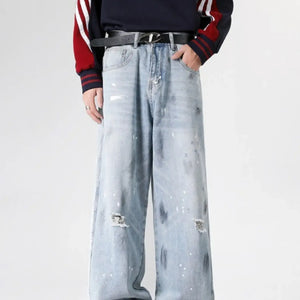 Light blue Luxenk© distressed wide-leg jeans featuring a relaxed fit and frayed details, perfect for casual wear.