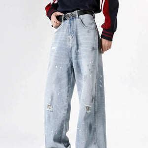 Light blue Luxenk© distressed wide-leg jeans with a relaxed fit, featuring a high waist and frayed hem for a casual, trendy look.