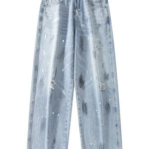 Light blue distressed wide leg jeans from Luxenk by Trendsi, featuring a relaxed fit and casual style.