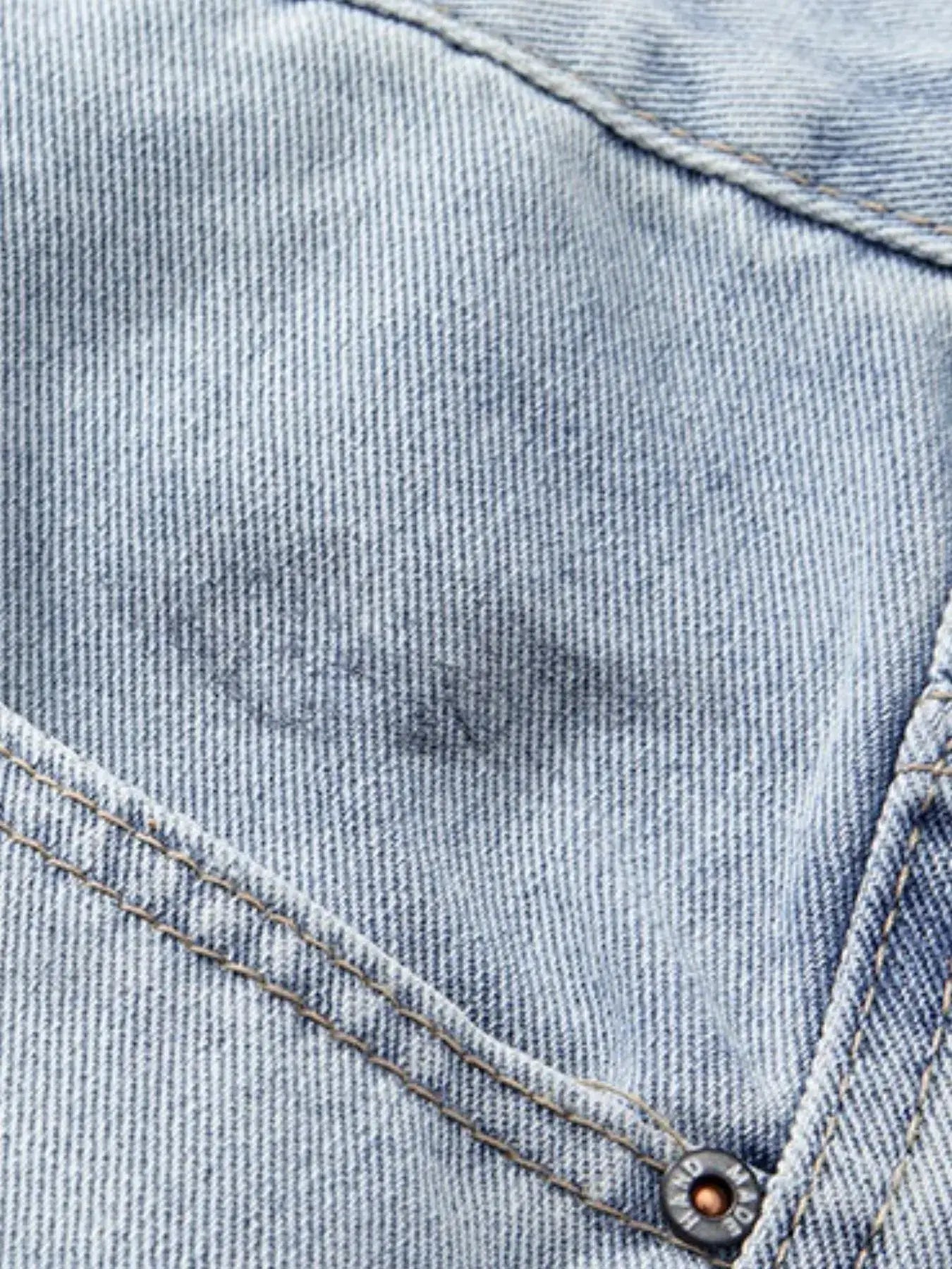 Light blue Luxenk© distressed wide-leg jeans featuring a relaxed fit and frayed details, showcased on a white background.
