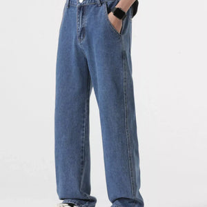 Light blue Luxenk Relaxed Fit Jeans by Trendsi, shown on a model, featuring a casual, comfortable fit and classic denim style.