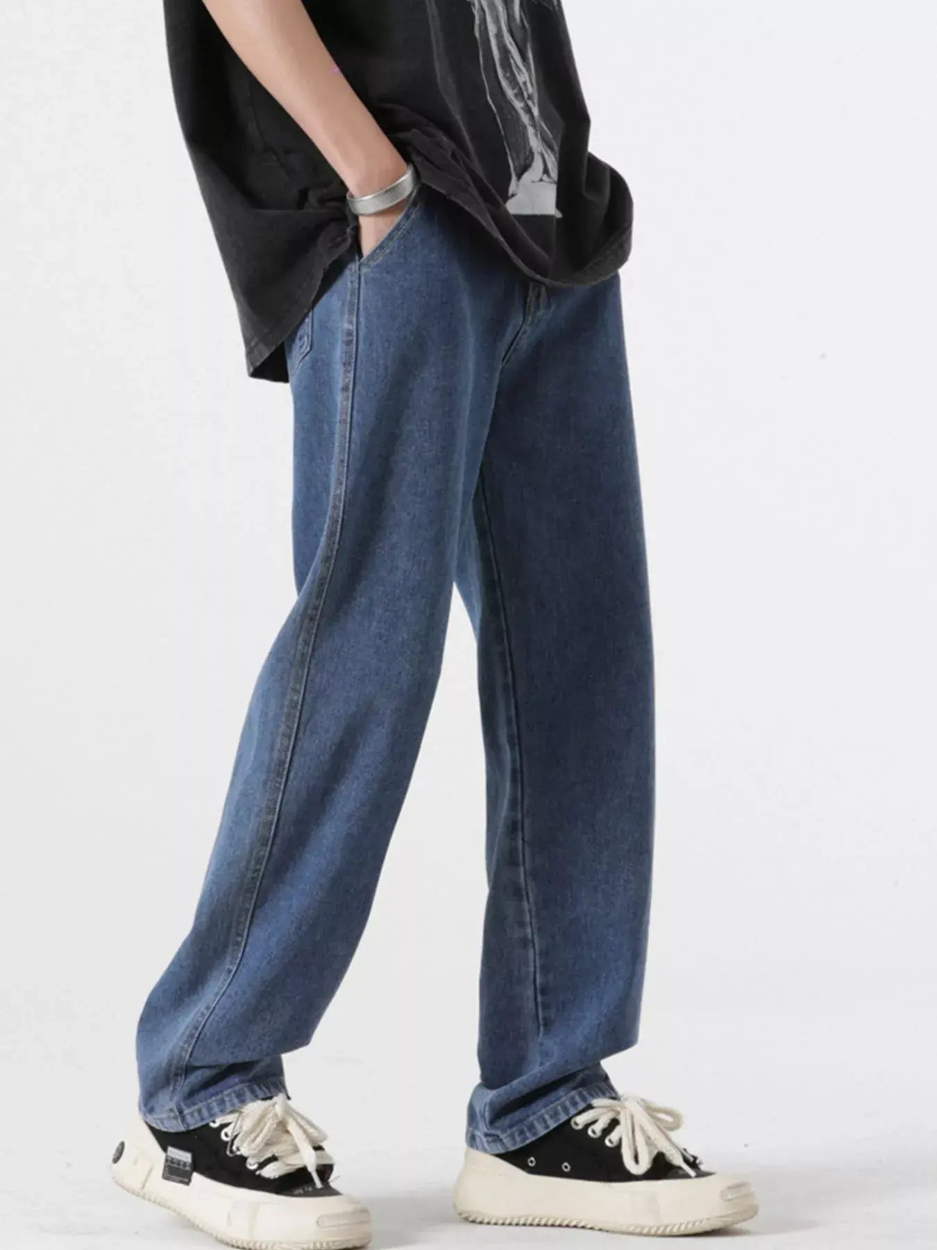 Light blue Luxenk Relaxed Fit jeans from Trendsi, showing a casual fit with front pockets and belt loops.