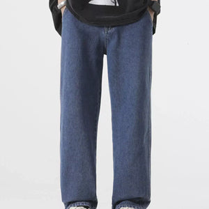 Light blue Luxenk Relaxed Fit Jeans by Trendsi, featuring a casual style and classic denim look, displayed on a model.