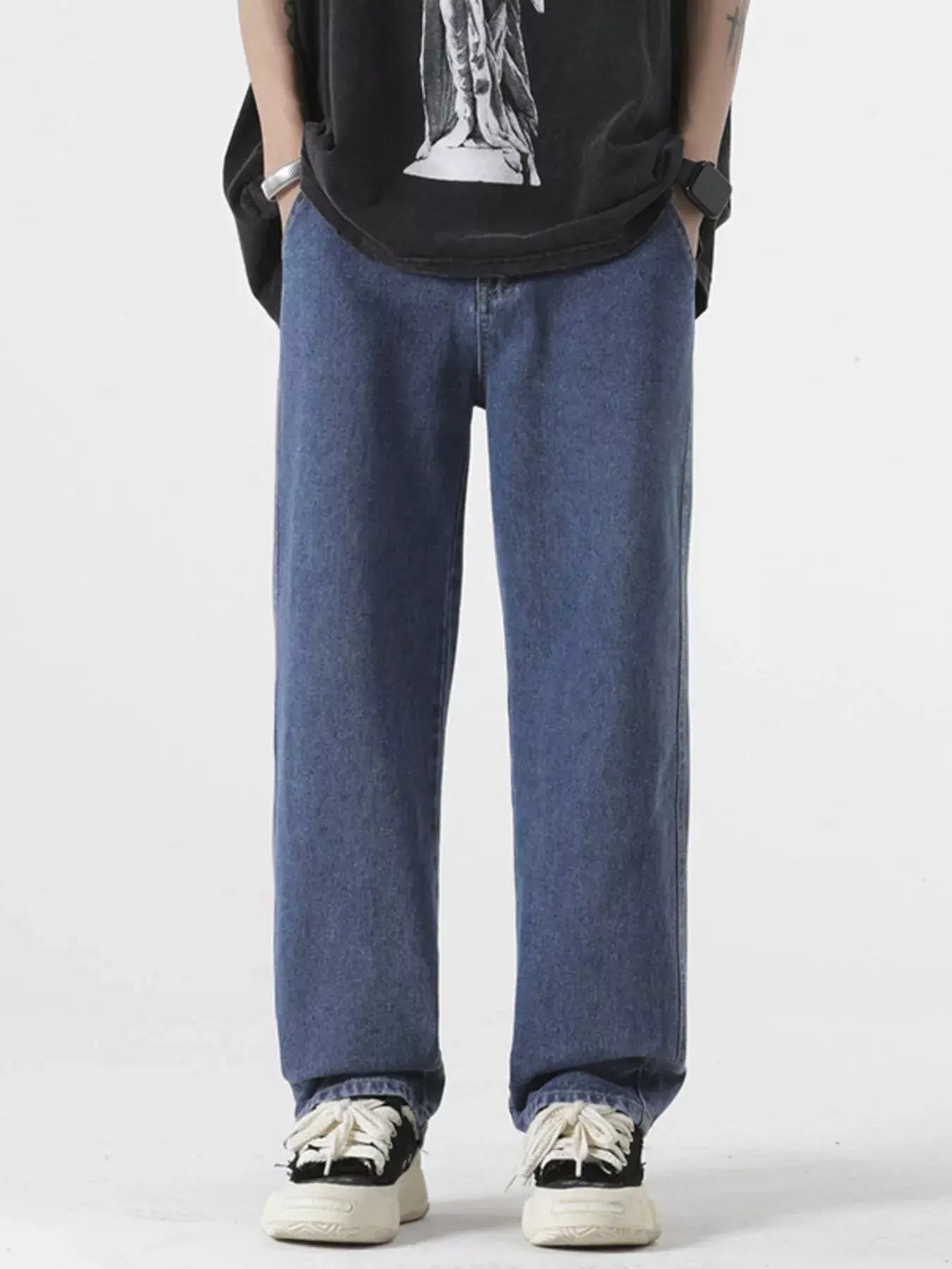 Light blue Luxenk Relaxed Fit Jeans by Trendsi, featuring a casual style and classic denim look, displayed on a model.