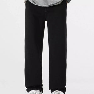 Light blue Luxenk Relaxed Fit jeans from Trendsi displayed on a model, showcasing a casual, comfortable denim style.