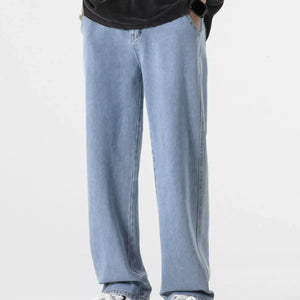 Light blue Luxenk Relaxed Fit jeans by Trendsi, showcasing a casual fit with classic denim texture and stitching details.