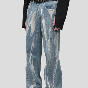 Light blue LUXENK© Paint Wide Leg Jeans by Trendsi with a relaxed fit and wide-leg style, shown on a model.