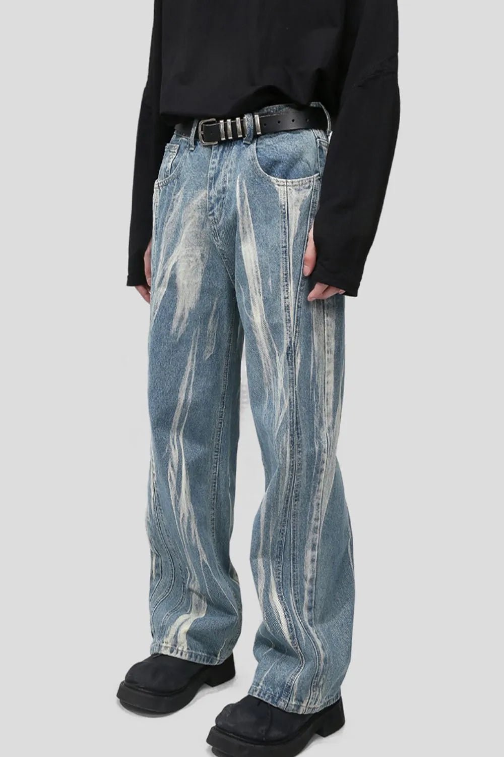 Light blue LUXENK© Paint Wide Leg Jeans by Trendsi with a relaxed fit and wide-leg style, shown on a model.