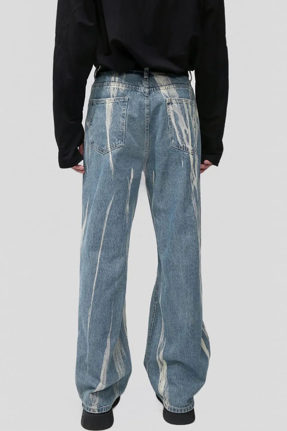 Light blue Luxenk Paint Wide Leg Jeans by Trendsi, featuring a relaxed fit, high waist, and wide pant legs.