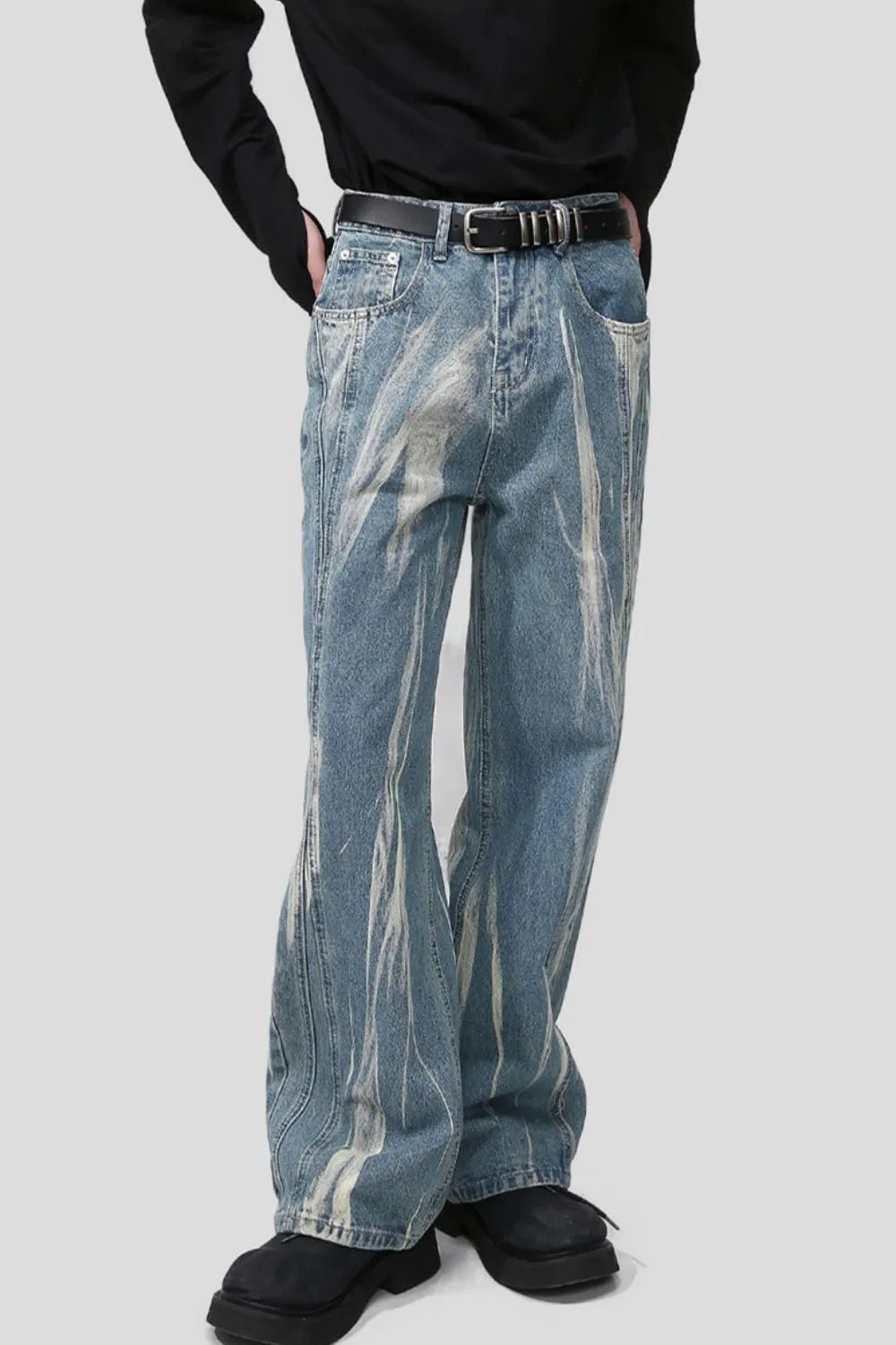 Light blue Luxenk Paint Wide Leg Jeans by Trendsi, featuring a high waist and relaxed fit with wide legs and classic denim stitching.