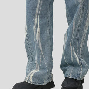 Light blue Luxenk Paint Wide Leg Jeans from Trendsi, featuring a relaxed fit, high waist, and wide leg design, shown on a model.