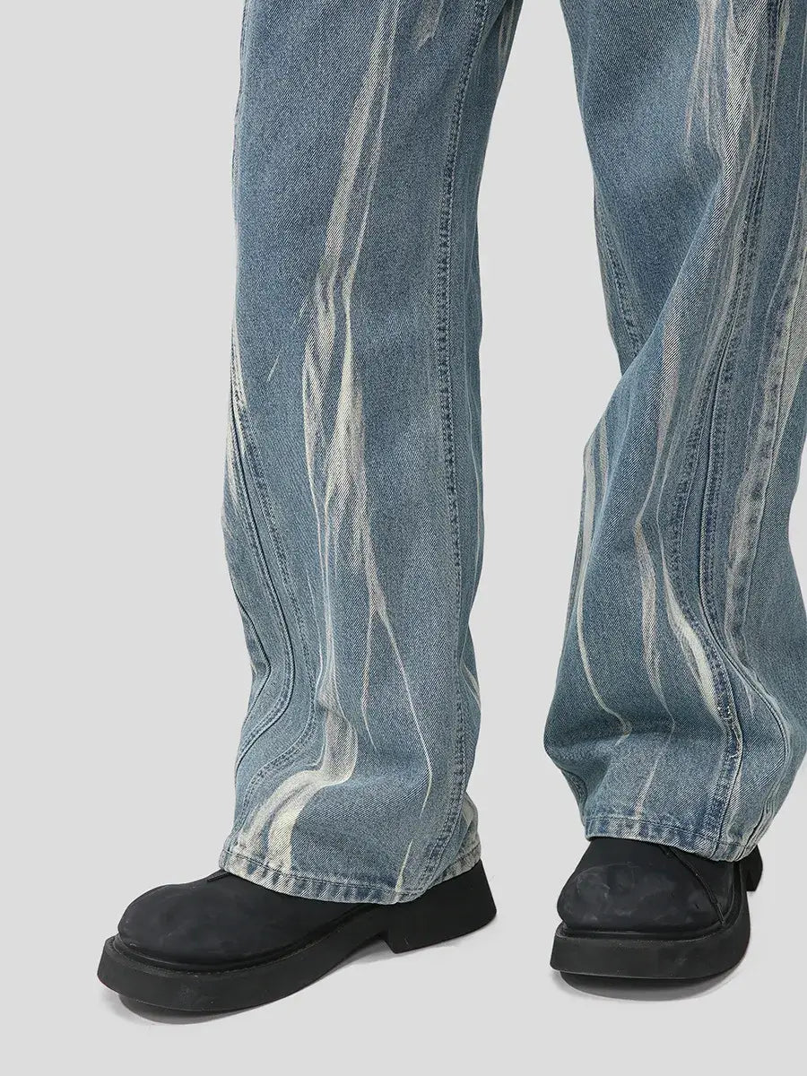 Light blue Luxenk Paint Wide Leg Jeans from Trendsi, featuring a relaxed fit, high waist, and wide leg design, shown on a model.