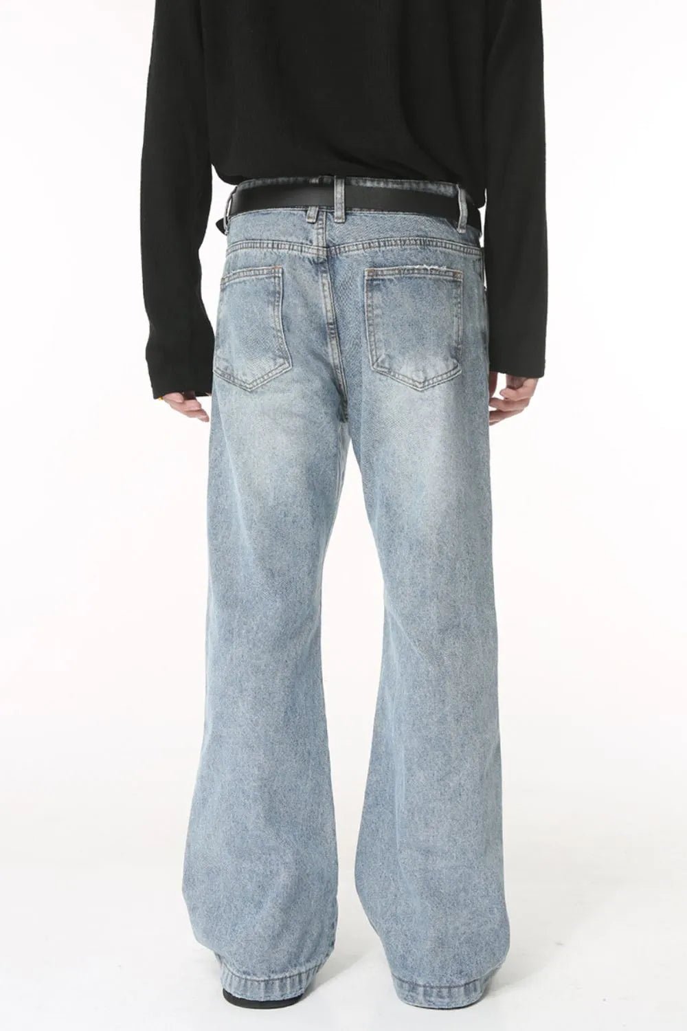 Light-washed Luxenk© "Washed Bootcut" jeans by Trendsi, featuring a relaxed fit and classic denim style.