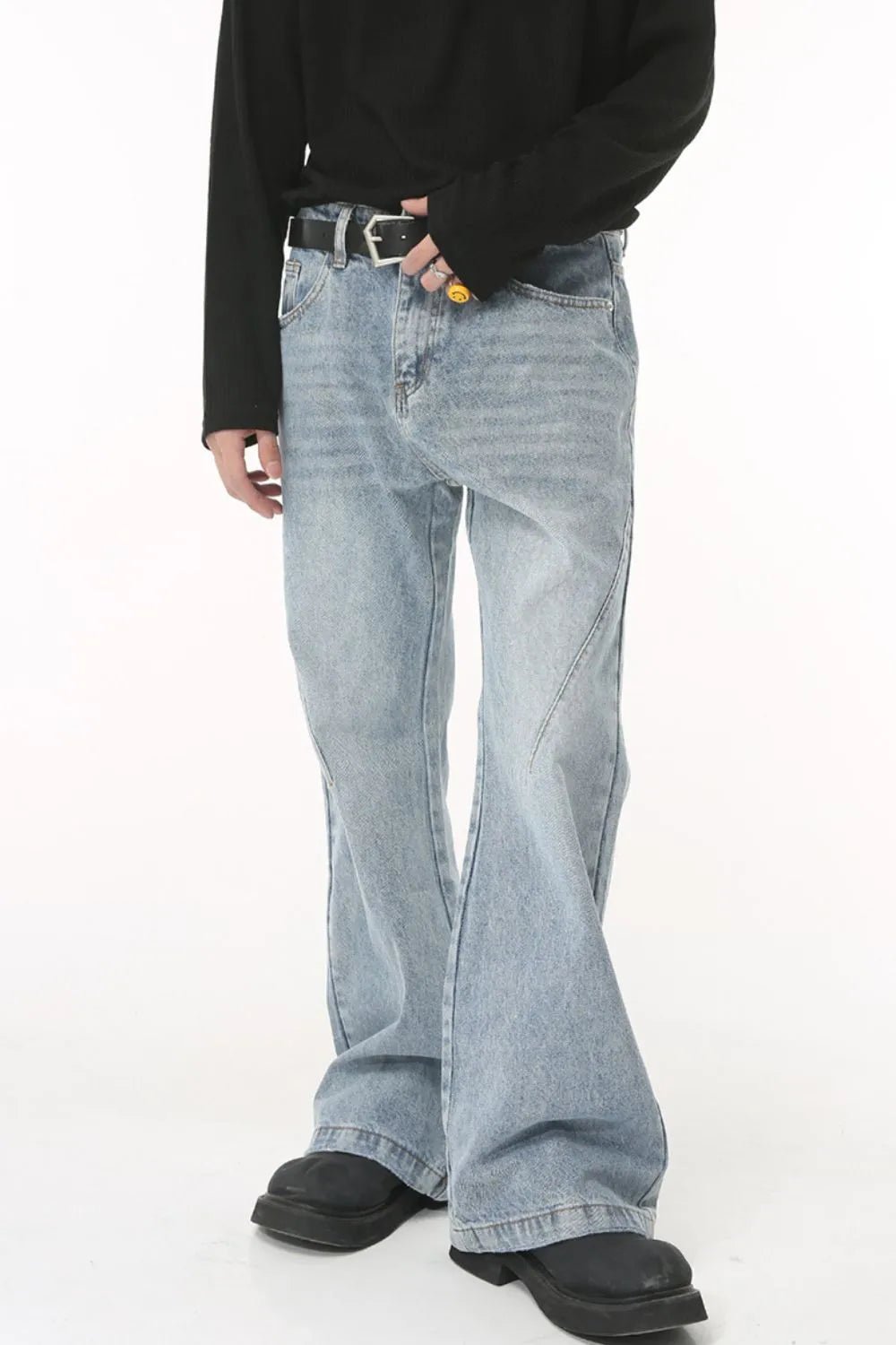 Luxenk washed bootcut jeans by Trendsi, medium size, showcasing classic denim fit and distressed wash with subtle fading.