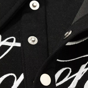 Scarlet LUXENK© "Letter Embroidered" polo shirt by Trendsi, featuring embroidered letter design and classic polo style.