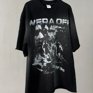 Black LUXENK Street Graphic T-shirt by Trendsi with spray dye design, casual fit, and bold urban style.