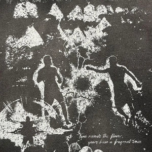 Black LUXENK Street Graphic T-shirt by Trendsi featuring spray dye design and bold street art style.