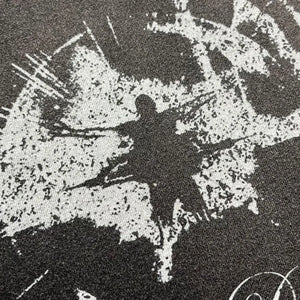 Black LUXENK Street Graphic T-shirt with spray dye design, featuring bold graphic artwork on the front.
