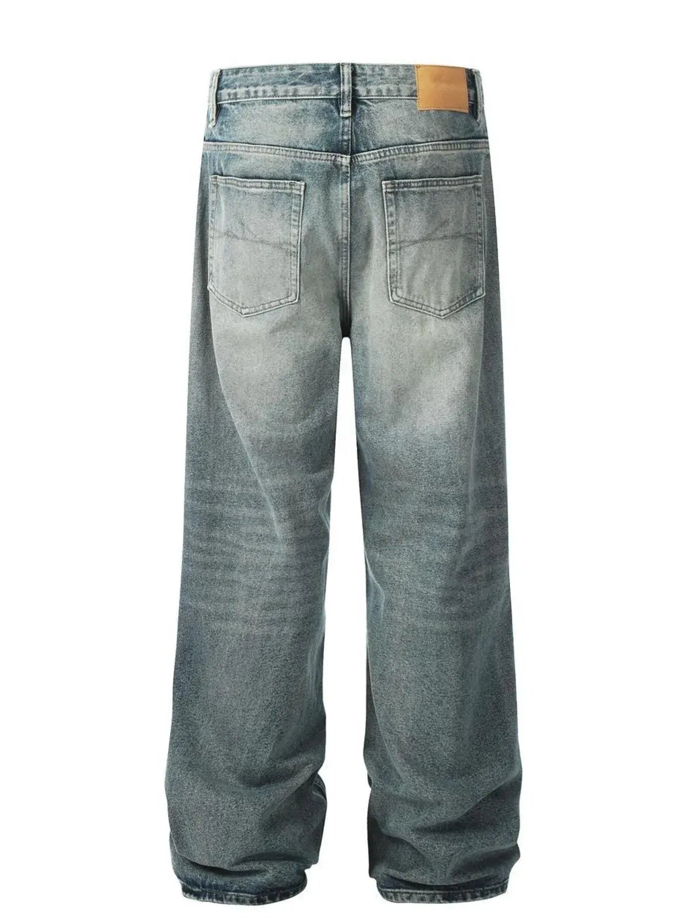 Light washed blue distressed vintage jeans by Luxenk, showing a relaxed fit and frayed hem details.