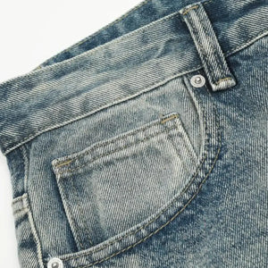 Light blue distressed vintage jeans by Luxenk for women, featuring a worn-in look and casual fit.