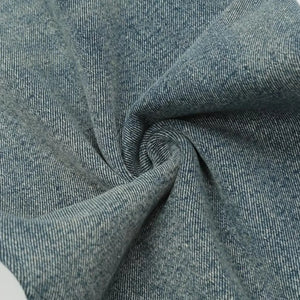 Light blue distressed vintage jeans by Luxenk from Trendsi, showing faded wash, frayed edges, and classic five-pocket style.